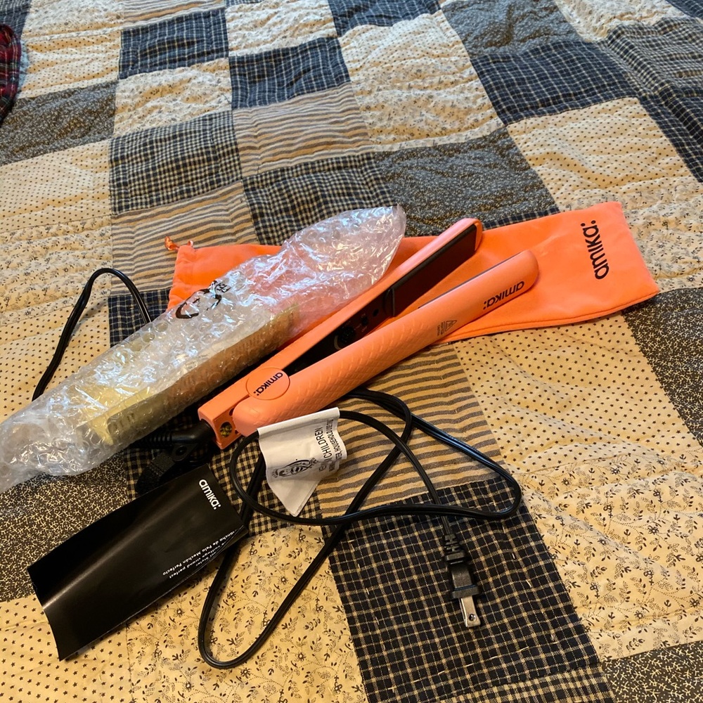 Amika hair straightener, pink/coral color